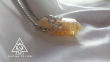 citrine point crystal amulet necklace with sterling silver fluer de lis motif made by chateau de lion.  cdl-neck-ctrne-pt-01.  side view