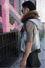 the silver cyber punk vest jacket made of designer vegan leather, lined with soft vegan fur or cotton, hand painted silver , by chateau de lion side view 