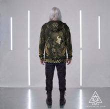 Athena Matrix black and gold graphic hoodie male model wearing futuristic goddess streetwear pullover by Chateau De Lion back view platinum hair  