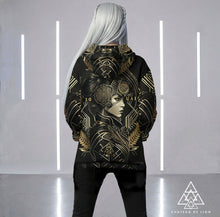 Athena Matrix black and gold graphic hoodie female model wearing futuristic goddess streetwear pullover by Chateau De Lion back view platinum hair 