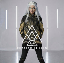 Athena Matrix black and gold graphic hoodie female model wearing futuristic goddess streetwear pullover by Chateau De Lion front view platinum hair blue eyes