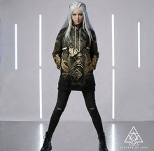 Athena Siren Hoodie by Chateau De Lion featuring gold Athena Goddess Warrior artwork on black premium luxury fashion design worn by female model