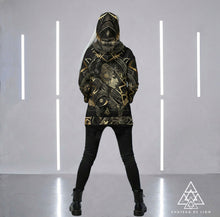 Athena Spoken Hoodie by Chateau De Lion featuring gold Athena Goddess Warrior artwork on black premium luxury fashion design worn by female model