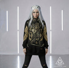 Athena Spoken Hoodie by Chateau De Lion featuring gold Athena Goddess Warrior artwork on black premium luxury fashion design worn by female model
