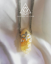 citrine point crystal amulet necklace with sterling silver fluer de lis motif made by chateau de lion.  cdl-neck-ctrne-pt-01.  front view