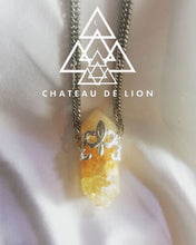 citrine point crystal amulet necklace with sterling silver fluer de lis motif made by chateau de lion.  cdl-neck-ctrne-pt-01. front view