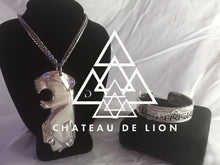 sterling silver jaguar shaman pendant necklace made by chateau de lion front view photographed with the shiva protection bracelet
.   cdl-neck-jgr-pnd-01