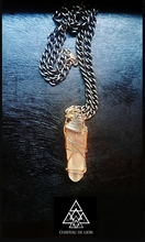 The lumerian and bismuth crystal wrap necklace made by chateau de lion