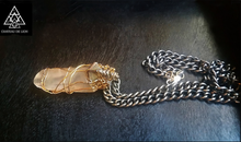 the lumerian and bismuth crystaal amulet necklace side view  made by chateau de lion.   
 cdl-neck-lmn-biz-01