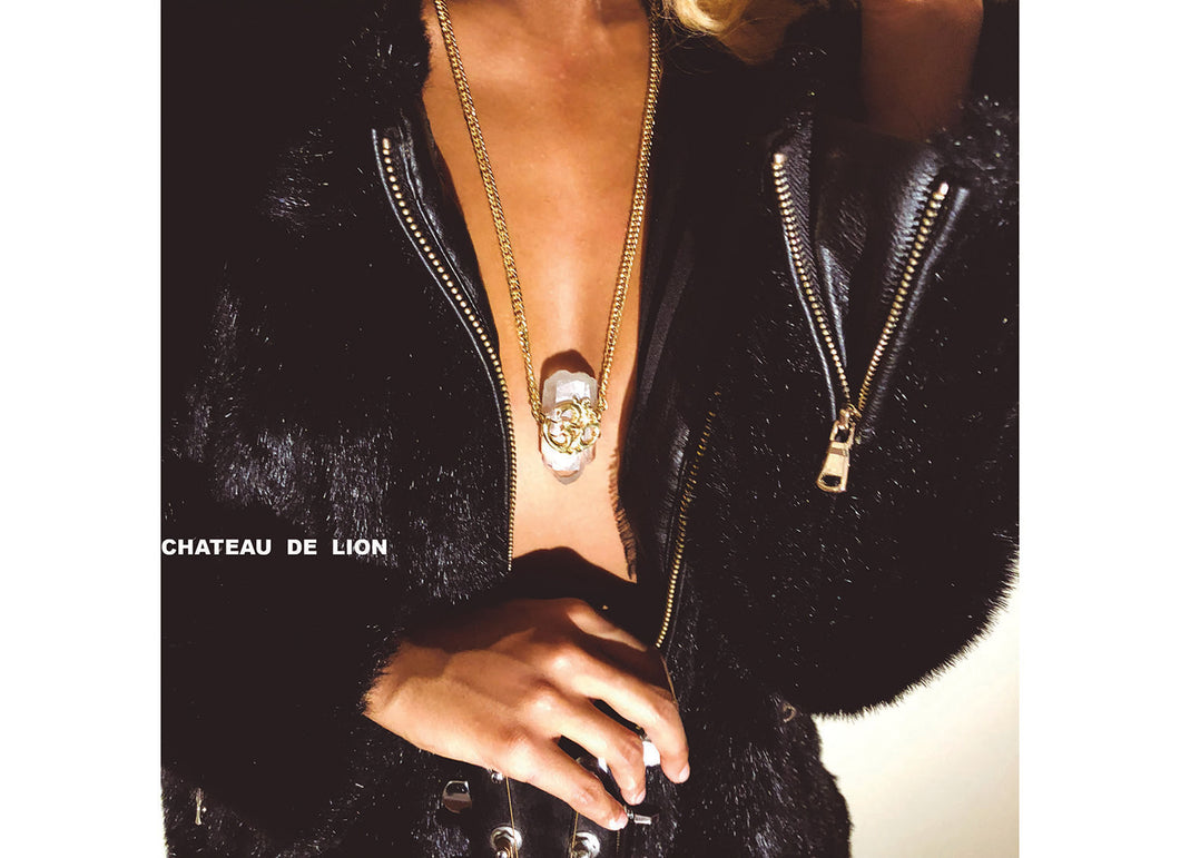 14k gold om crystal amulet neckclace worn by a model made by chateau de lion   cdl-neck-om-crystl-01