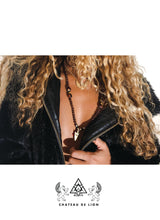 shiva mala necklace with 14 k gold arrow pendant made by chateau de lion worn by a model cdl-mla-shva-001