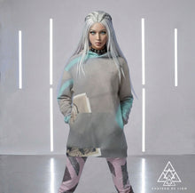 Model Wearing Designer Native Whisperer Hoodie and The Pink Graffiti Leggings by Chateau De Lion