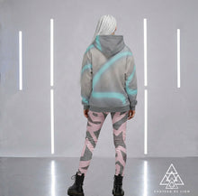 Model Wearing Designer Native Whisperer Hoodie and The Pink Graffiti Leggings by Chateau De Lion
