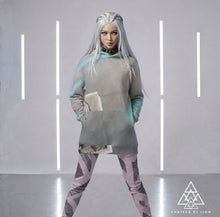 Model Wearing Designer Native Whisperer Hoodie and The Pink Graffiti Leggings by Chateau De Lion