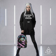 RVR GRL baby pink backpack modeled by female model wearing the queens live forever hoodie with cyber punk vibes by Chateau De Lion