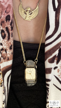 time crystal quartz crystal necklace worn by model with the egyptian goddess isis pendant necklace made of 14k gold made by chateau de lion cdl-neck-tm-001