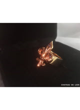 The Fluer De Lis ring in 14k gold made by chateau de lion. side view  cdl-rg-flr-gld-01